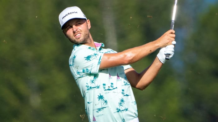 Adam Svensson hits his fairway shot on the fourth hole during the second round of the Sentry Tournament of Champions.